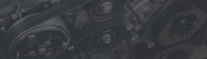 Part of an engine, with a dark grey overlay.